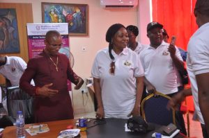 Hon.Charles Explaining A Point During A Talk